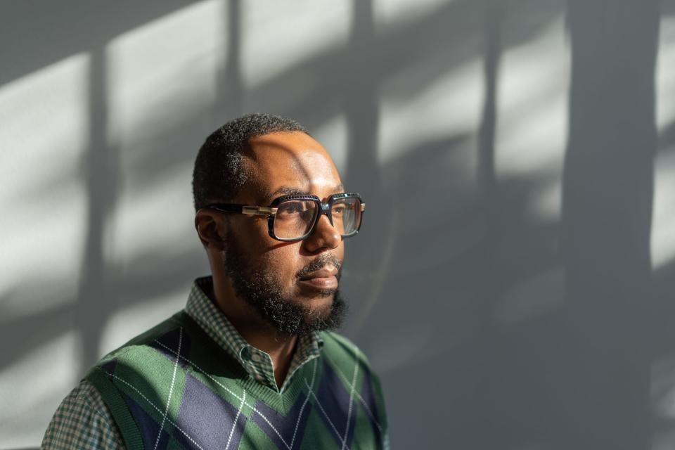 Cleamon Moorer, former administrator and faculty member at Baker College, stands at his office for American Advantage Home Care, Inc. in Dearborn on Wednesday, Nov. 3, 2021. Moorer was hired as the systemwide dean of business, a new consolidated position; spearheaded the program's accreditation; and ran a short-lived campus magazine. He left in 2019, after about three years because he was disappointed the school did not seem to be putting a sufficiently serious and robust effort in educating underserved students.