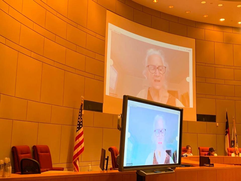 Charlotte Mecklenburg Schools teacher assistant Stephanie Donnis speaks to the Mecklenburg Board of County Commissioners about increasing TA pay in the school system.