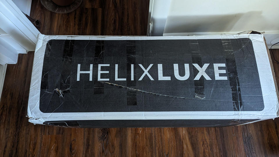 Helix Dusk Luxe mattress rolled and vacuum packed in a box