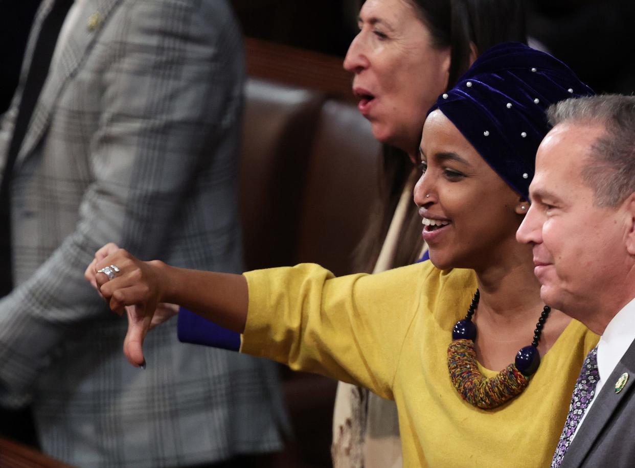 Democratic Rep. Ilhan Omar of Minnesota gives a thumbs-down during a vote to adjourn in the House chamber during the third day of elections for Speaker of the House at the US Capitol Building on January 5, 2023 in Washington, DC.