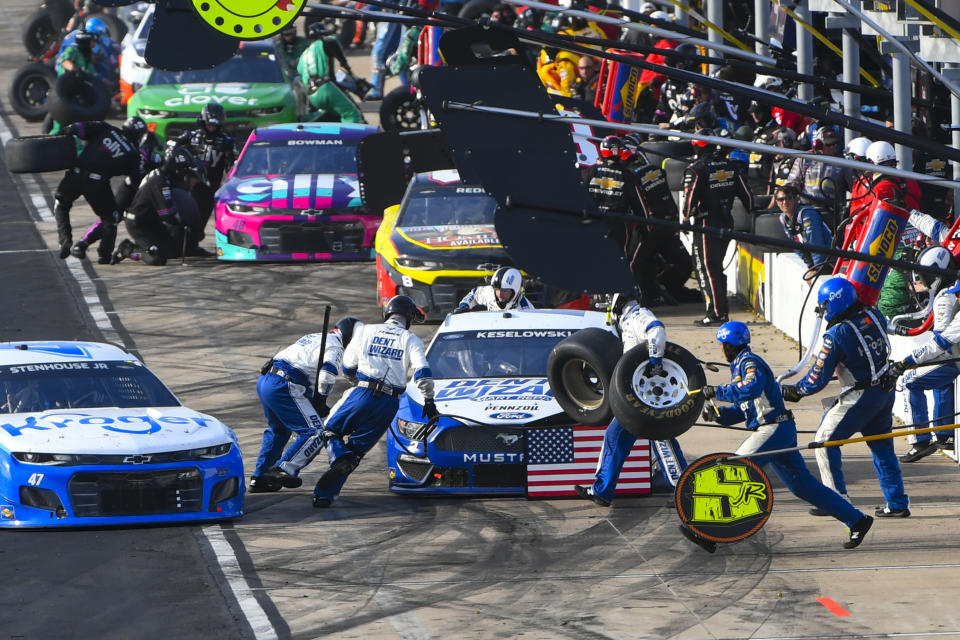 Brad Keselowski makes a pitstop during a NASCAR Cup Series auto race Sunday, June 20, 2021, in Lebanon, Tenn. (AP Photo/John Amis)