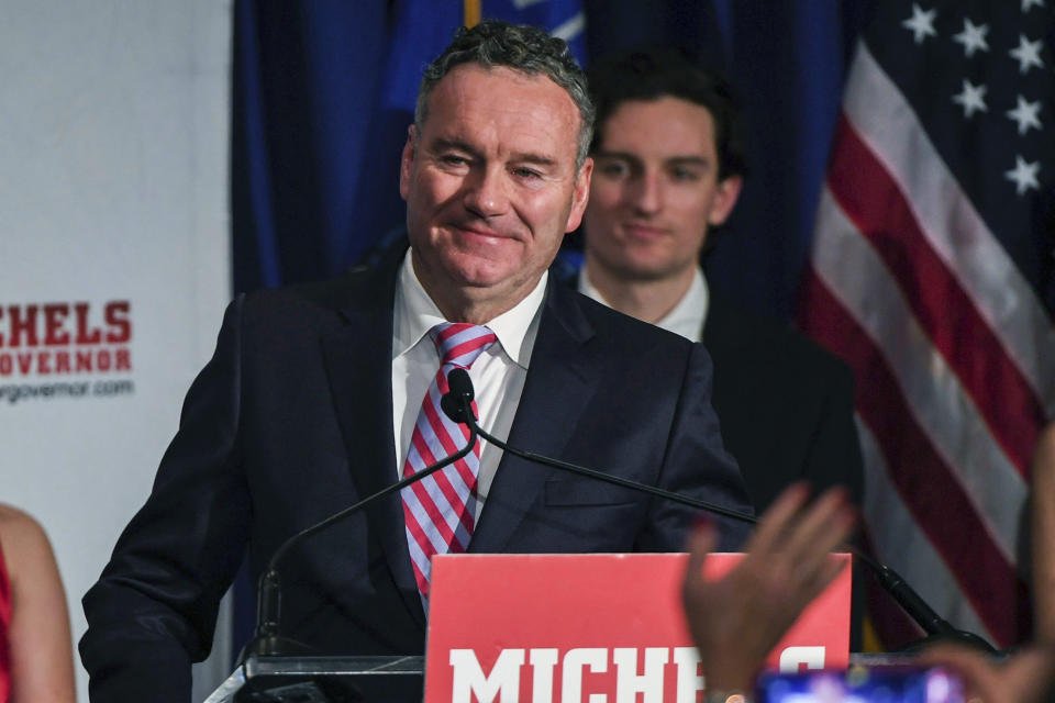 FILE - Wisconsin Republican gubernatorial candidate Tim Michels makes his way to the podium to address his supporters at the Italian Community Center early Wednesday, Nov. 9, 2022, in Milwaukee. Election deniers who backed Donald Trump's efforts to overturn the 2020 presidential election failed in some of their highest-profile races. (AP Photo/Kenny Yoo, File)