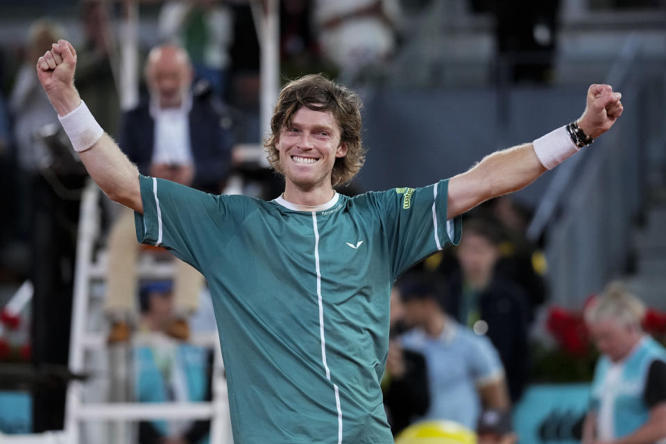 Andrey Rublev, of Russia, celebrates after winning the final match against Felix Auger-Aliassime, of Canada, at the Madrid Open tennis tournament in Madrid, Spain, Sunday, May 5, 2024. (AP Photo/Manu Fernandez)