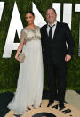 Georgina Chapman and Harvey Weinstein, co-chairman of The Weinstein Company arrive at the 2013 Vanity Fair Oscar Party hosted by Graydon Carter at Sunset Tower on February 24, 2013 in West Hollywood, California.