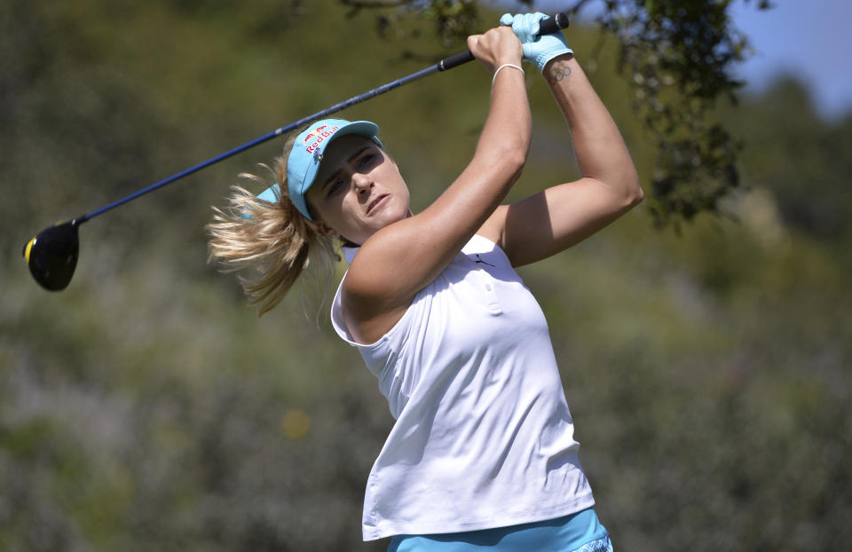 Lexi Thompson plays her shot from the eighth tee during the first round of the Kia Classic LPGA golf tournament, Thursday, March 28, 2019, in Carlsbad, Calif. (AP Photo/Orlando Ramirez)