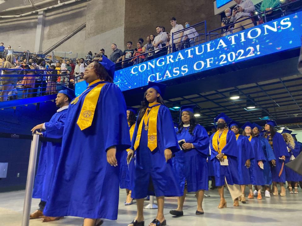 Fayetteville State University graduates of the Class of 2022 line up during commencement ceremonies Saturday, May 7, 2022, at Crown Coliseum.