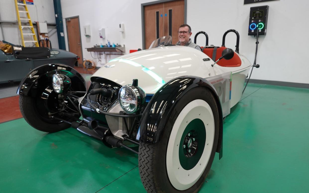 The all-electric Morgan XP1, with  Morgan's chief technology officer, Matt Hole, in the driving seat