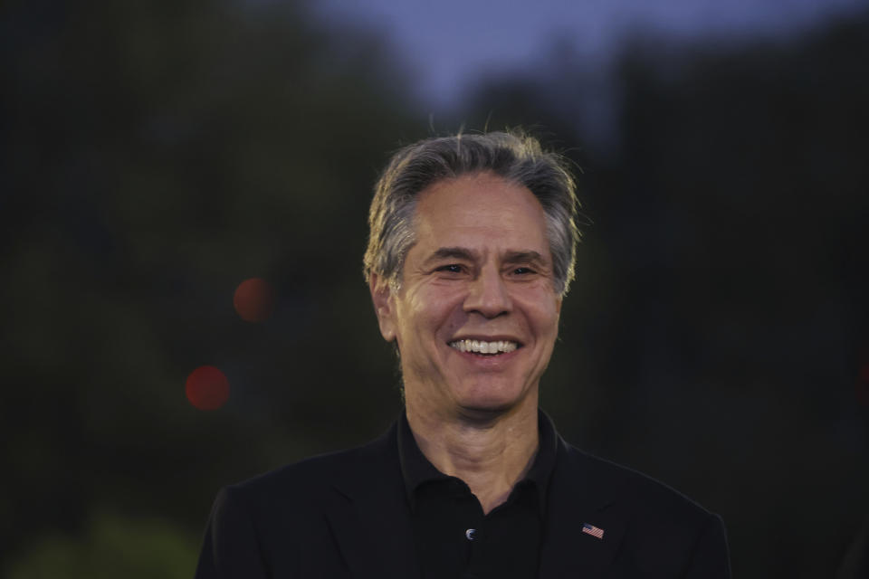 U.S. Secretary of State Anthony Blinken reacts as he listens to a youth representative during a visit to Oxygen Park at Education City, in Doha Qatar, Monday, Nov. 21, 2022. (Karim Jaafar/Pool via AP)