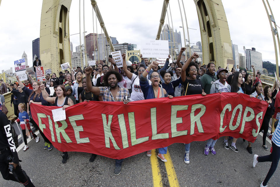 Protesters angry about the killing of Antwon Rose cross Pittsburgh’s Roberto Clemente Bridge during an evening rush hour march on June 22. (Photo: Gene J. Puskar/AP)