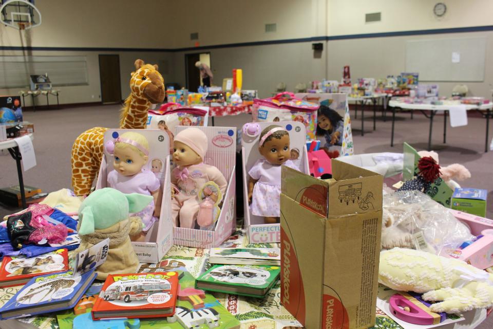 Toys at the Christmas Store at First Presbyterian Church, 116 North 12th St. in Fort Smith, are placed on tables grouped by age and gender.