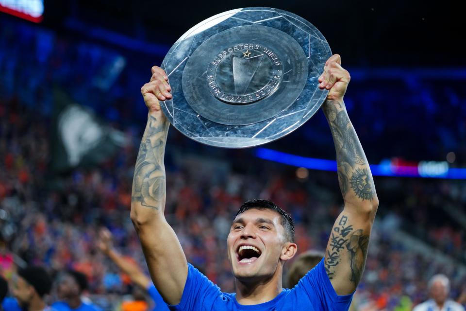 Oct. 4: FC Cincinnati's Brandon Vazquez celebrates with the Supporters’ Shield at TQL Stadium. The 2023 Supporters' Shield is the first trophy won by FC Cincinnati in its MLS history.