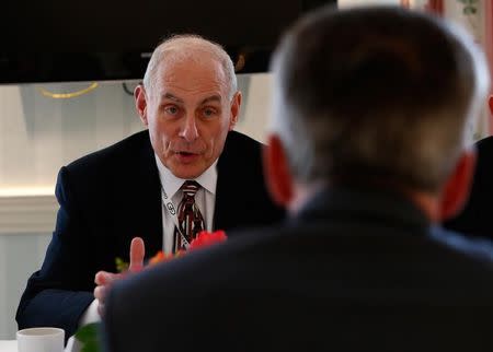 U.S. Homeland Security Secretary John Kelly talks to German Interior Minister Thomas de Maiziere during their meeting at the 53rd Munich Security Conference in Munich, Germany, February 18, 2017. REUTERS/Michaela Rehle