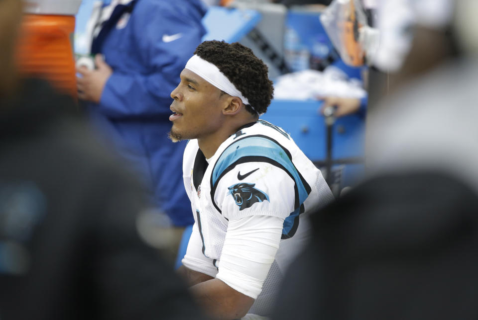 Cam Newton made quite an appearance and disappearance at Wednesday's media session with reporters. (AP) 