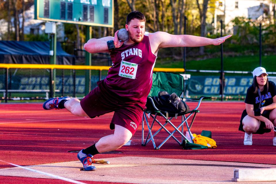 Bishop Stang's Jacob Cookinham wins the shot put event at the Sunset Twilight Invitational.