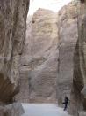 This April 23, 2016 photo shows a security officer talking on his phone in the Siq gorge in the vast archeological site of Petra, Jordan. This Middle Eastern country delivers a blockbuster list of iconic ancient monuments, otherworldly landscapes and warmhearted hospitality, with Petra as its tourism jewel. (Giovanna Dell'Orto AP)