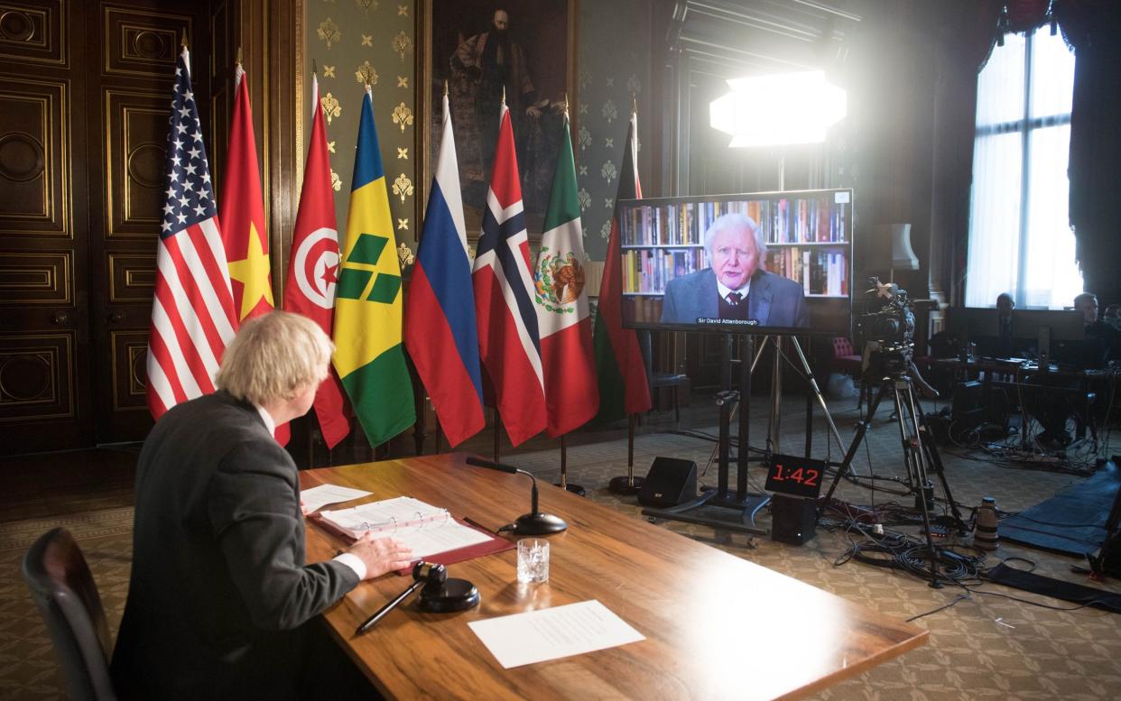 Prime Minister Boris Johnson watches a video address by Sir David Attenborough - WPA Pool /Getty Images Europe 