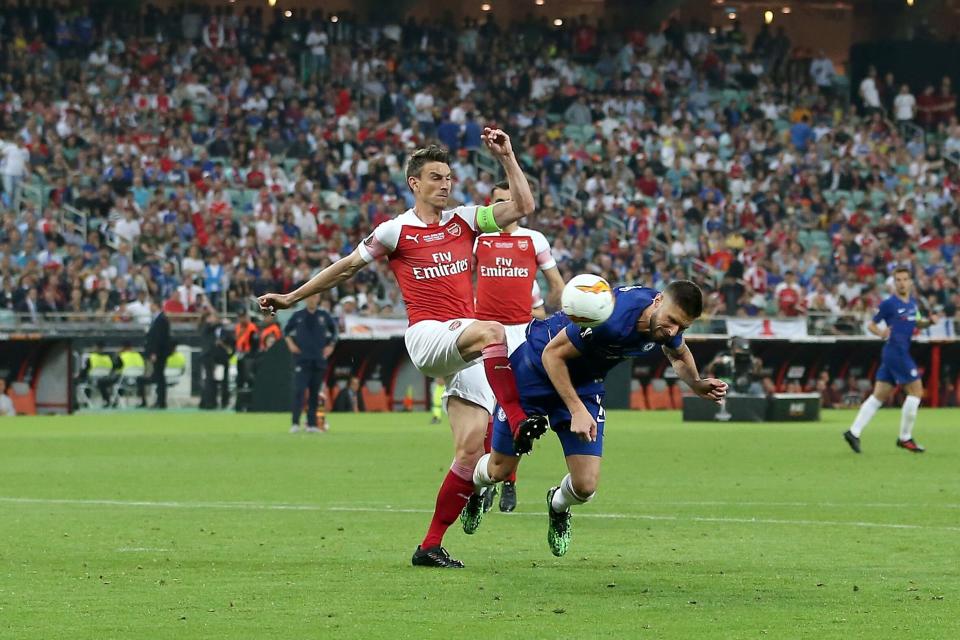 (L-R) Laurent Koscielny of Arsenal FC, Olivier Giroud of Chelsea FC 1-0 during the UEFA Europa League final match between Chelsea FC and Arsenal FC at the Baki Olimpiya Stadionu on May 29, 2019 in Baku, Azerbaijan(Photo by VI Images via Getty Images)