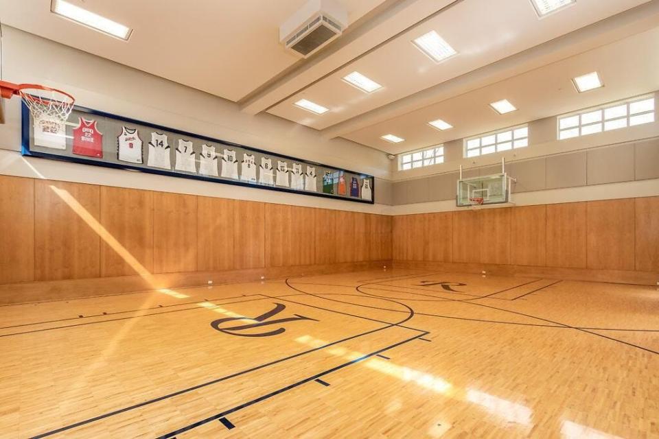 Former Ohio State and NBA star Michael Redd's home features a basketball court emblazoned with two Rs on the floor.