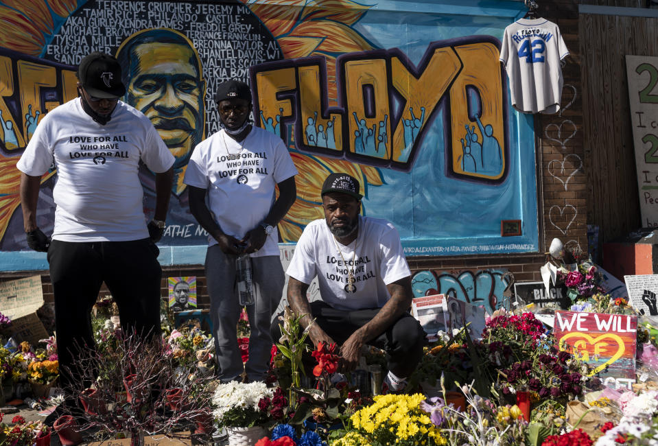 Former NBA player Stephen Jackson (right), a friend of George Floyd's, poses for a photograph at a memorial for Floyd on Wednesday. (Stephen Maturen/Getty Images)