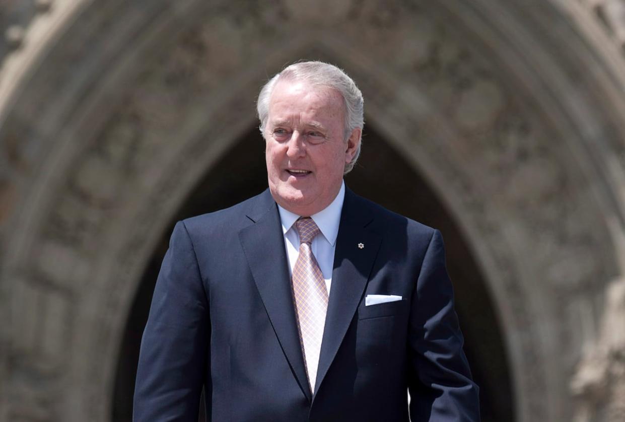 Former prime minister Brian Mulroney leaves Parliament Hill in Ottawa on June 6, 2012. The Prime Minister's Office announced Tuesday that Mulroney's state funeral will be held March 23 in Montreal. (Adrian Wyld/The Canadian Press - image credit)
