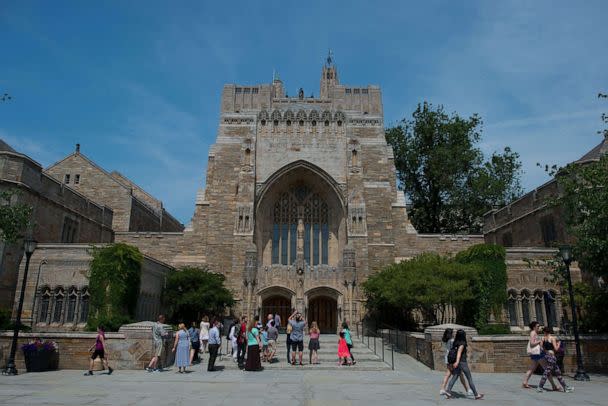 PHOTO: A tour group makes a stop at the Sterling Memorial Library on the Yale University campus, June 12, 2015, in New Haven, Conn.  (Craig Warga/Bloomberg via Getty Images)