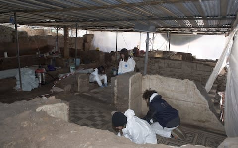 Archaeologists work at the site of the new metro station, Amba Aradam. - Credit: Italian cultural heritage ministry