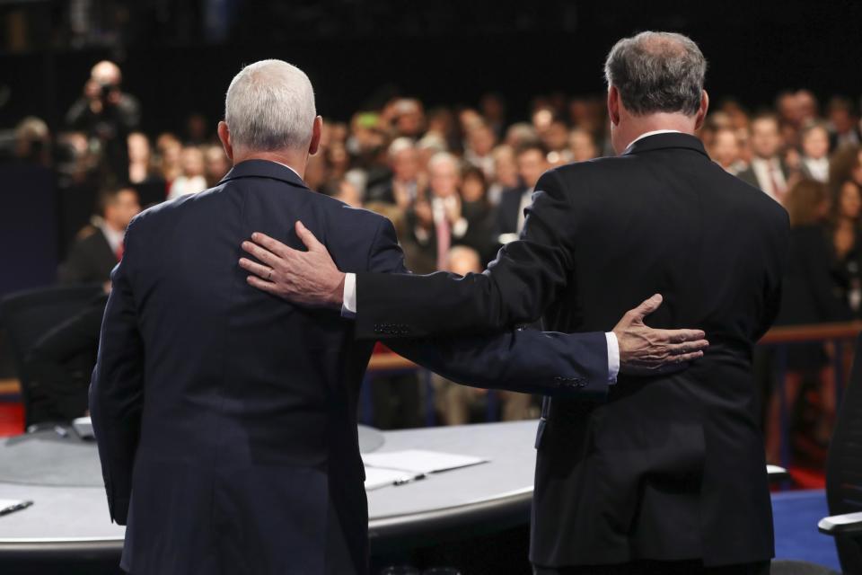 Republican nominee Gov. Mike Pence and Democratic nominee Sen. Tim Kaine at the end of the vice presidential debate at Longwood University in Farmville, Va., on Tuesday. (Photo: Joe Raedle/Pool via AP)