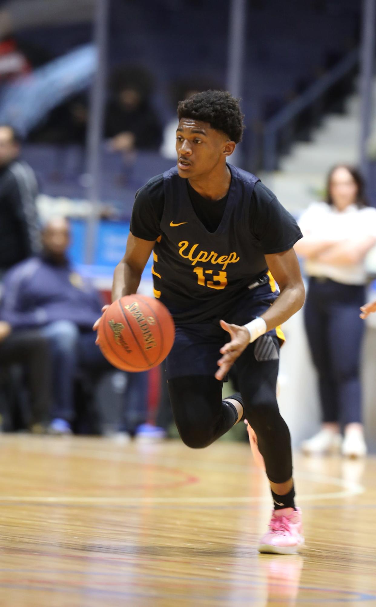 UPrep's Jermelle Cotton looks for an open player to pass to.