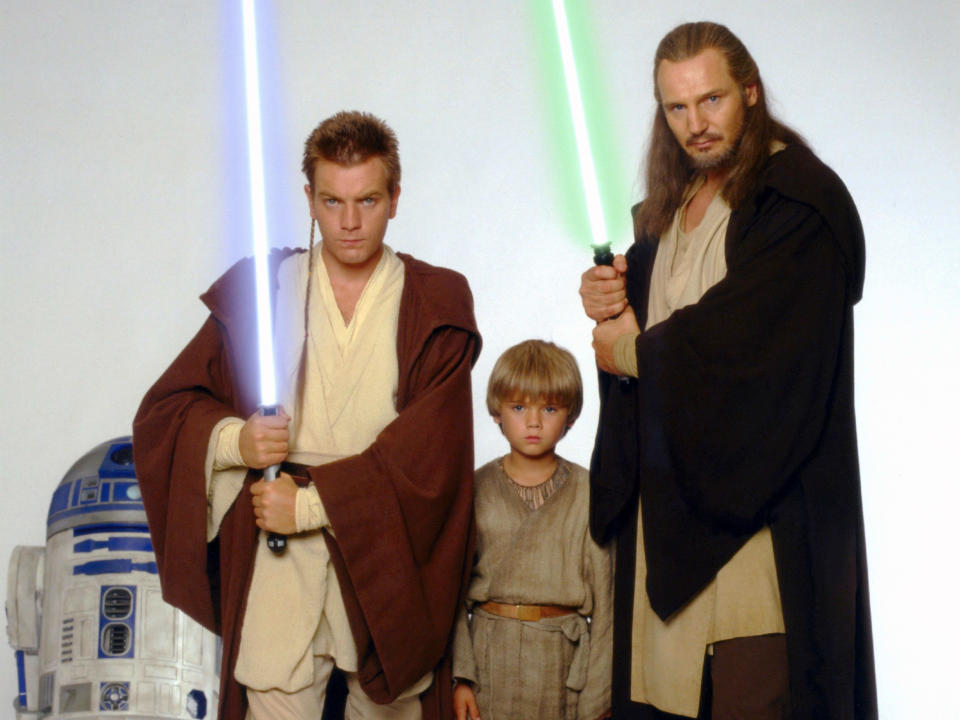 Ewan McGregor and Liam Neeson flank Jake Lloyd who played the young Darth Vader aka Anakin Skywalker. (Alamy)