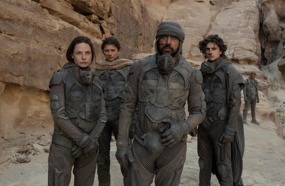 Rebecca Ferguson (from left) stars as Lady Jessica, Zendaya is Chani, Javier Bardem plays Stilgar and Timothee Chalamet is Paul Atreides in the sci-fi epic "Dune."