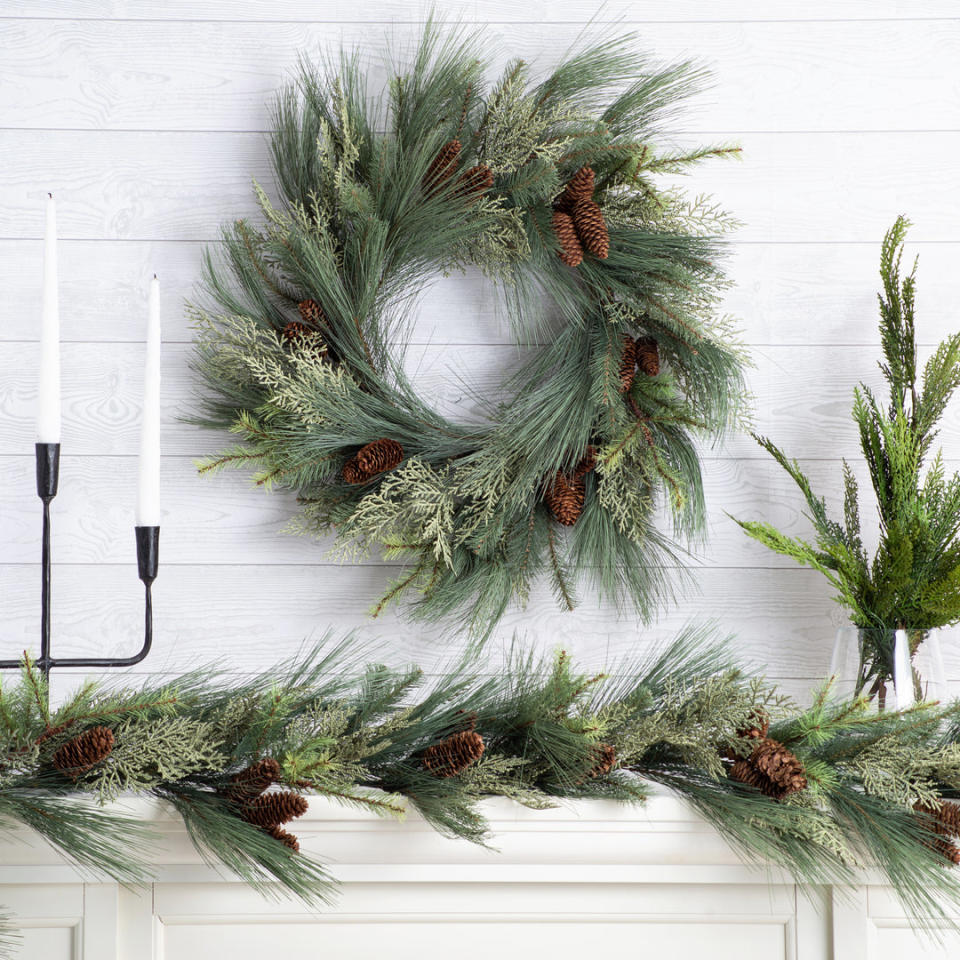 <p><a href="https://darbycreektrading.com/collections/christmas-wreaths/products/sage-long-needle-pine-holiday-front-door-christmas-wreath" rel="nofollow noopener" target="_blank" data-ylk="slk:Shop Now;elm:context_link;itc:0;sec:content-canvas" class="link ">Shop Now</a></p><p>Sage Cedar & Long Needle Pine Front Door Christmas Wreath</p><p>darbycreektrading.com</p><p>$99.00</p><span class="copyright">Darby Creek Trading</span>