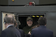 Ukrainian Minister of Defense Oleksii Reznikov, looks at a Ground Master 200 (GM200) radar during a visit at Thales radar factory in Limours, south west of Paris, France, Wednesday, Feb. 1, 2023. France has guaranteed Kyiv the delivery of a Ground Master 200 (GM200) radar, produced by the French manufacturer Thales. This medium-range radar is capable of spotting enemy aircraft at 250 km and engaging them at 100 km, whether they are flying at low speed and low altitude like drones or at high altitude like fighter planes. (AP Photo/Christophe Ena)