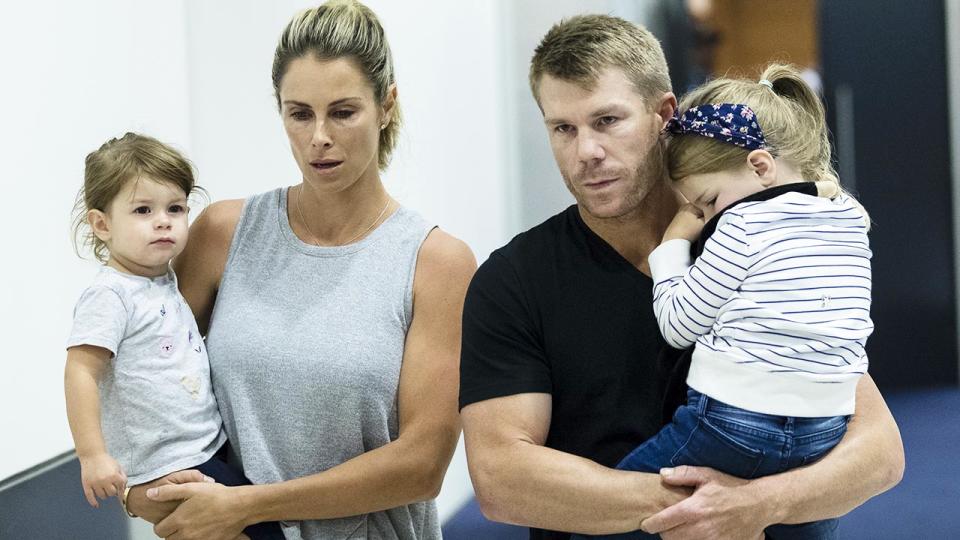 David Warner, pictured here with wife Candice and their young children.