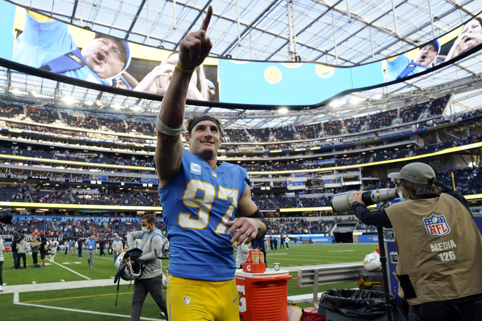 Los Angeles Chargers defensive end Joey Bosa (97) walks off the field after a win over the Denver Broncos during an NFL football game Sunday, Jan. 2, 2022, in Inglewood, Calif. (AP Photo/Ashley Landis)