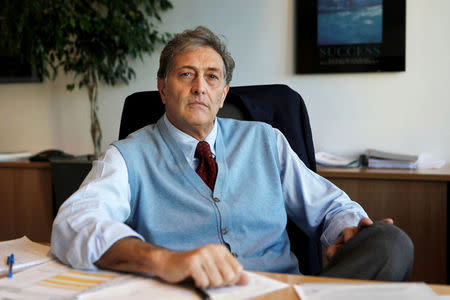 FILE PHOTO: Guido Rasi, executive director the European Medicines Agency at his office in London January 6, 2012. REUTERS/Finbarr O'Reilly/File Photo