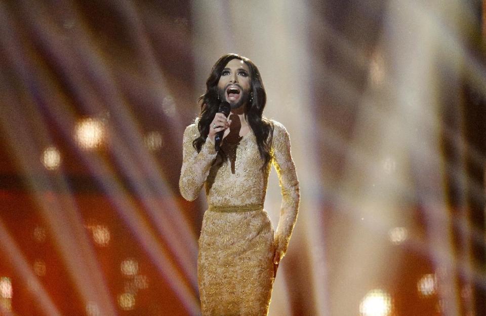 Singer Conchita Wurst representing Austria performs the song 'Rise Like a Phoenix' during the final of the Eurovision Song Contest in the B&W Halls in Copenhagen, Denmark, Saturday, May 10, 2014.(AP Photo/Frank Augstein)