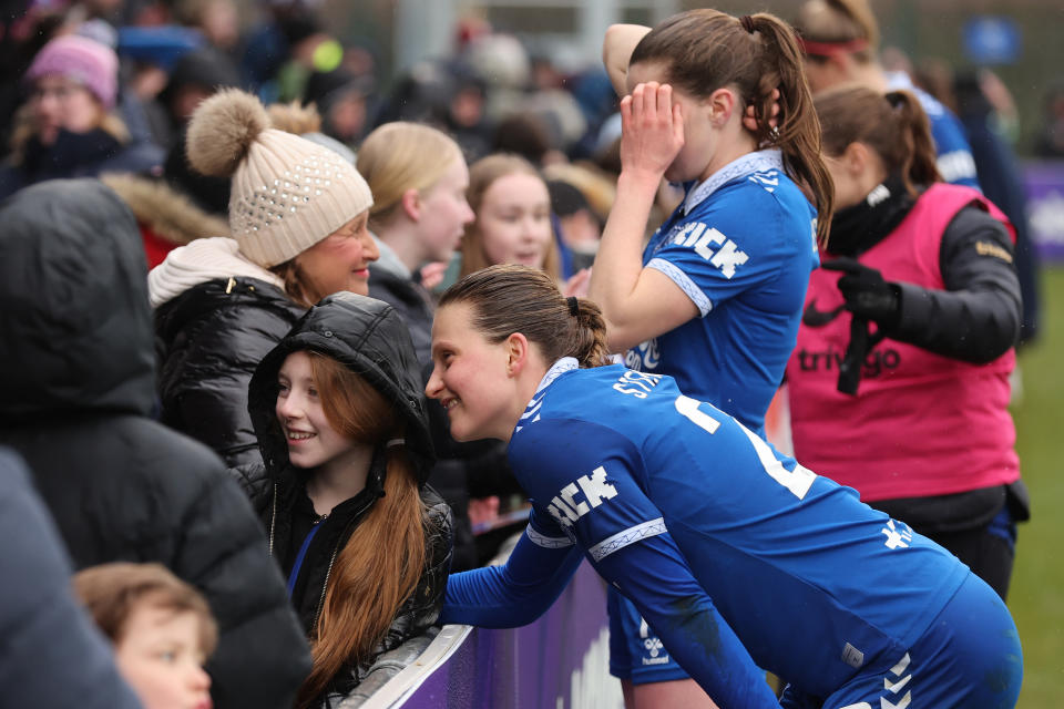 LIVERPOOL, ENGLAND - MARCH 10: Elise Stenevik of Everton poses with a fan during the Adobe Women's FA Cup Quarter Final match between Everton and Chelsea at Walton Hall Park on March 10, 2024 in Liverpool, England. (Photo by Jan Kruger - The FA/The FA via Getty Images)