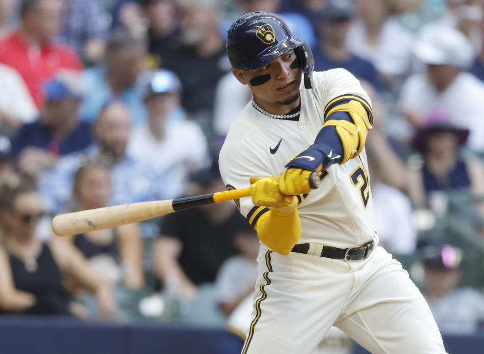 Milwaukee Brewers' William Contreras hits a home run against the Minnesota Twins during the third inning of a baseball game Wednesday, Aug 23, 2023, in Milwaukee. (AP Photo/Jeffrey Phelps)