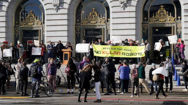 PHOTO: People take part in a demonstration about the use of robots by the San Francisco Police Department outside of City Hall in San Francisco, on Dec. 5, 2022. (Jeff Chiu/AP)