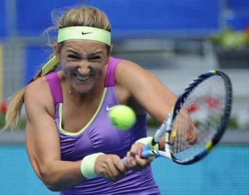 Belarussian Victoria Azarenka returns a ball to Poland's Agnieszka Radwanska during their semi-final at the Madrid Masters on May 12, 2012. Azarenka won 6-2, 6-4. Azarenka booked her place in a second straight final at the Madrid Masters after stretching her 2012 winning streak over Agnieszka Radwanska to six matches this season with a 6-2, 6-4 victory on Saturday