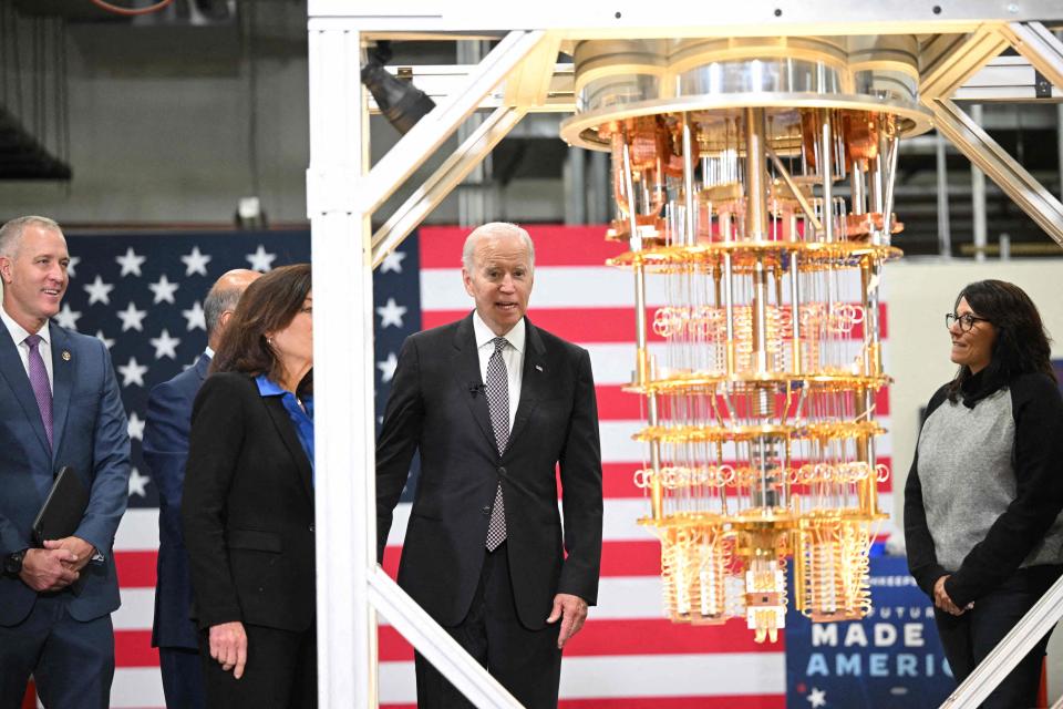 US President Joe Biden looks at a quaantum computer as he tours the IBM facility in Poughkeepsie, New York, on October 6, 2022. - IBM's CEO Arvind Krishna announced Thursday a $20-billion investment in quantum computing, semiconductor manufacturing and other high-tech areas in its New York state facilities. (Photo by MANDEL NGAN / AFP) (Photo by MANDEL NGAN/AFP via Getty Images)