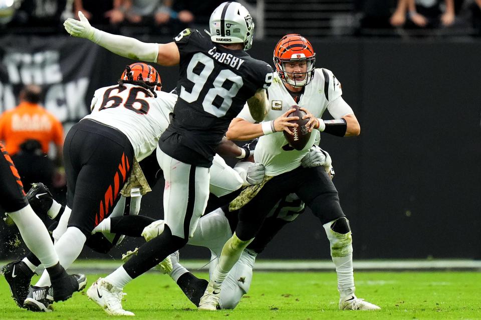 Cincinnati Bengals quarterback Joe Burrow (9) is sacked in the second quarter during a NFL Week 11 game against the Las Vegas Raiders, Sunday, Nov. 21, 2021, at Allegiant Stadium in Las Vegas.