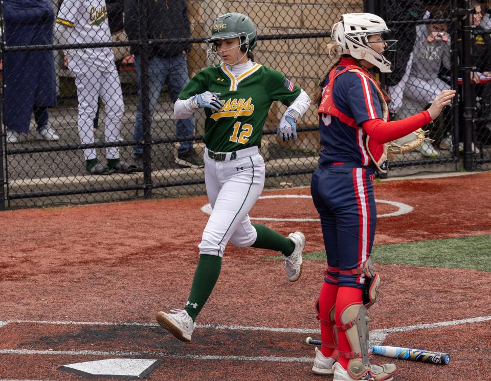 RBC Nicole Knox scores on a wild pitch in the third inning make it 3-1. Red Bank Catholic Girls Softball defeats Wall 6-2 in home game on April 4, 2024