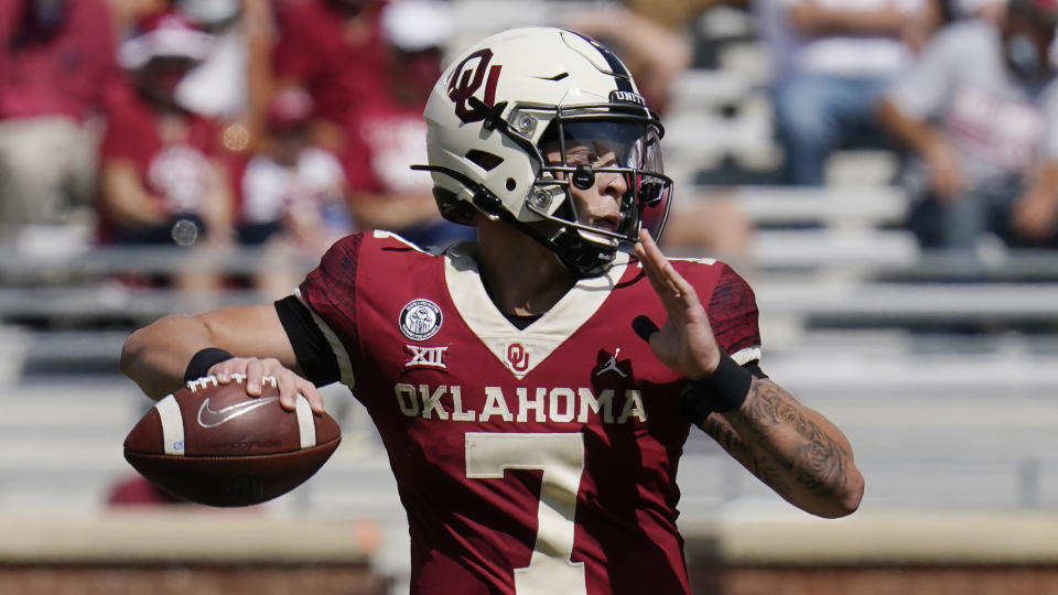 Oklahoma quarterback Spencer Rattler (7) passes in the second half of an NCAA college football game against Kansas State Saturday, Sept. 26, 2020, in Norman, Okla. (AP Photo/Sue Ogrocki).