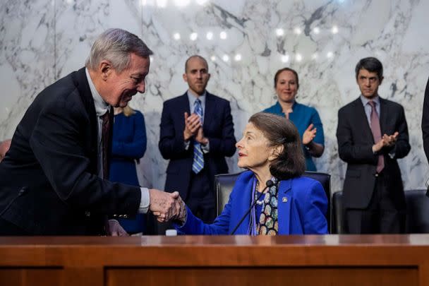 PHOTO: Committee chairman Sen. Dick Durbin shakes hands with Sen. Dianne Feinstein as she arrives and takes her seat at a business hearing of the Senate Judiciary Committee on Capitol Hill, May 10, 2023, in Washington, D.C. (Drew Angerer/Getty Images)