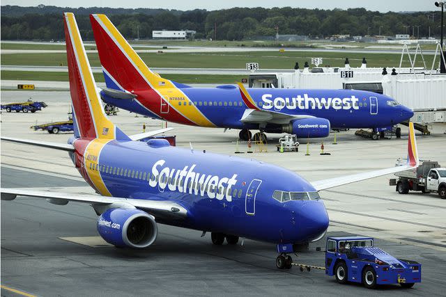 <p>Kevin Dietsch/Getty Images</p> A Southwest Airlines airplane taxies from a gate at Baltimore Washington International Thurgood Marshall Airport on October 11, 2021 in Baltimore, Maryland.