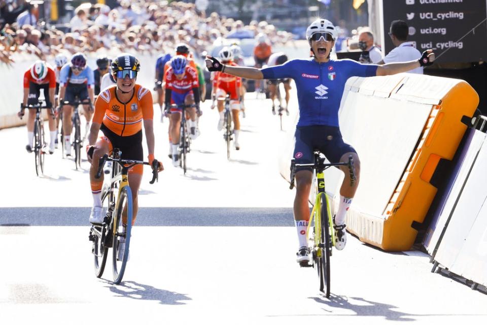 Elisa Balsamo of Italy crosses the finish line ahead of Marianne Vos to win the women’s road race at the World Road Cycling Championships (Olivier Matthys/AP) (AP)