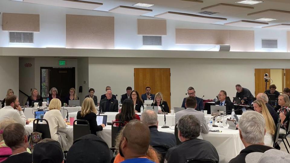 Construction workers look on at a Monday meeting of the Joint Powers Authority of Pismo Beach, Grover Beach and Arroyo Grande. The three cities met Monday to discuss the best way to get local construction workers to complete the Central Coast Blue water recycling project.