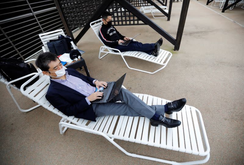 'Amusement Workation' lets teleworkers work from a Ferris wheel and pool side amid the coronavirus disease (COVID-19) outbreak, at Yomiuriland in Tokyo