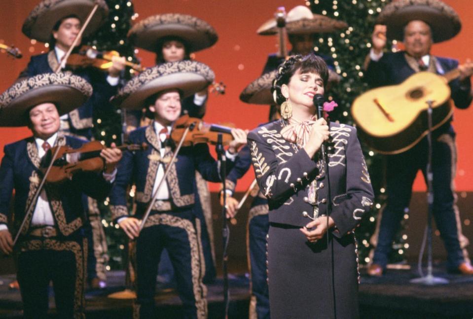 <div class="inline-image__caption"><p>Linda Ronstadt performs a song from her album <em>Canciones De Mi Padre</em> on the <em>Johnny Carson Show</em>. The album went double platinum, and at the 31st GRAMMY Awards won Best Mexican-American Performance.</p></div> <div class="inline-image__credit">Steffin Butler/NBCU Photo Bank</div>